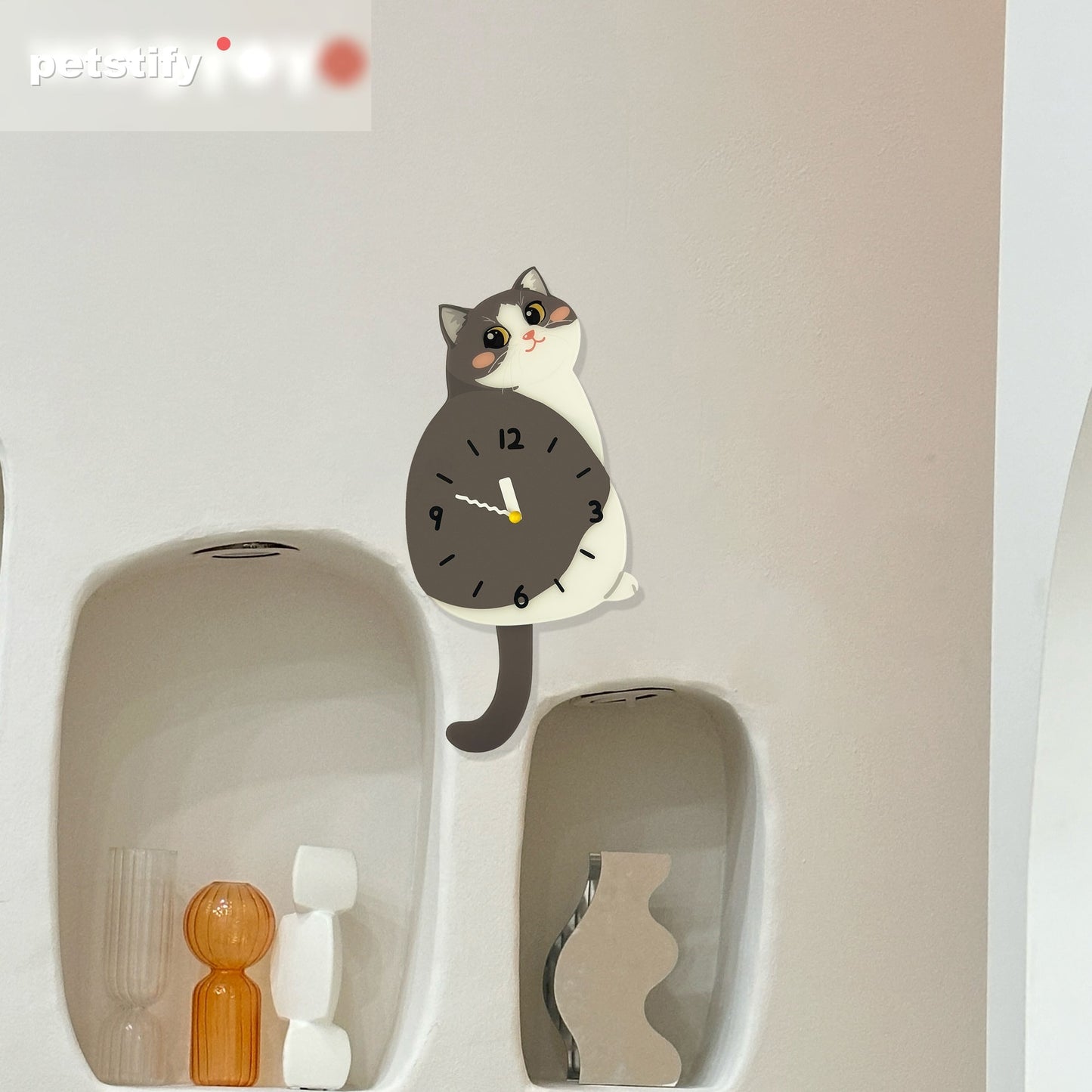 Blue and White Cat Petstify cat wall clock with playful swinging detail