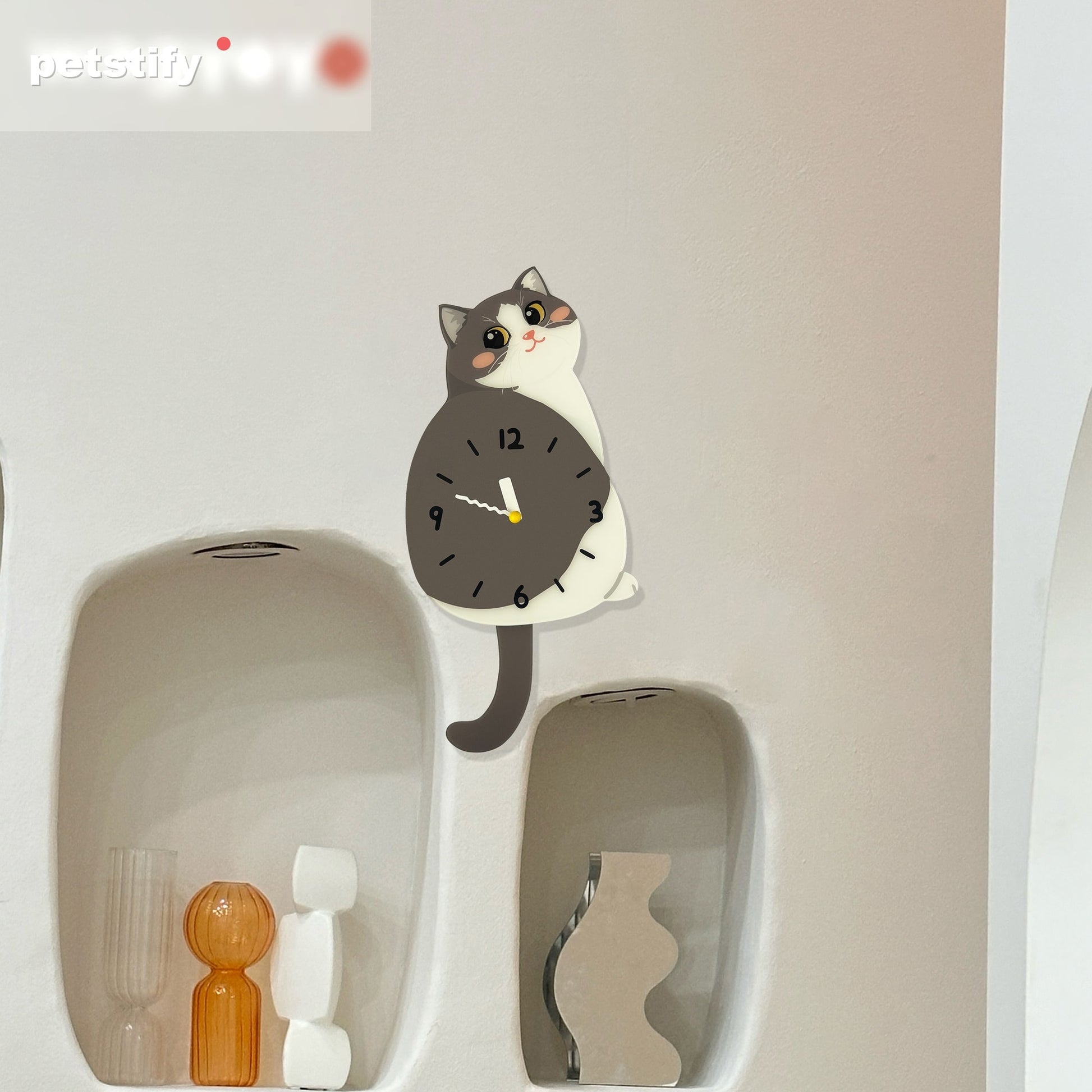 Blue and White Cat Petstify cat wall clock with playful swinging detail