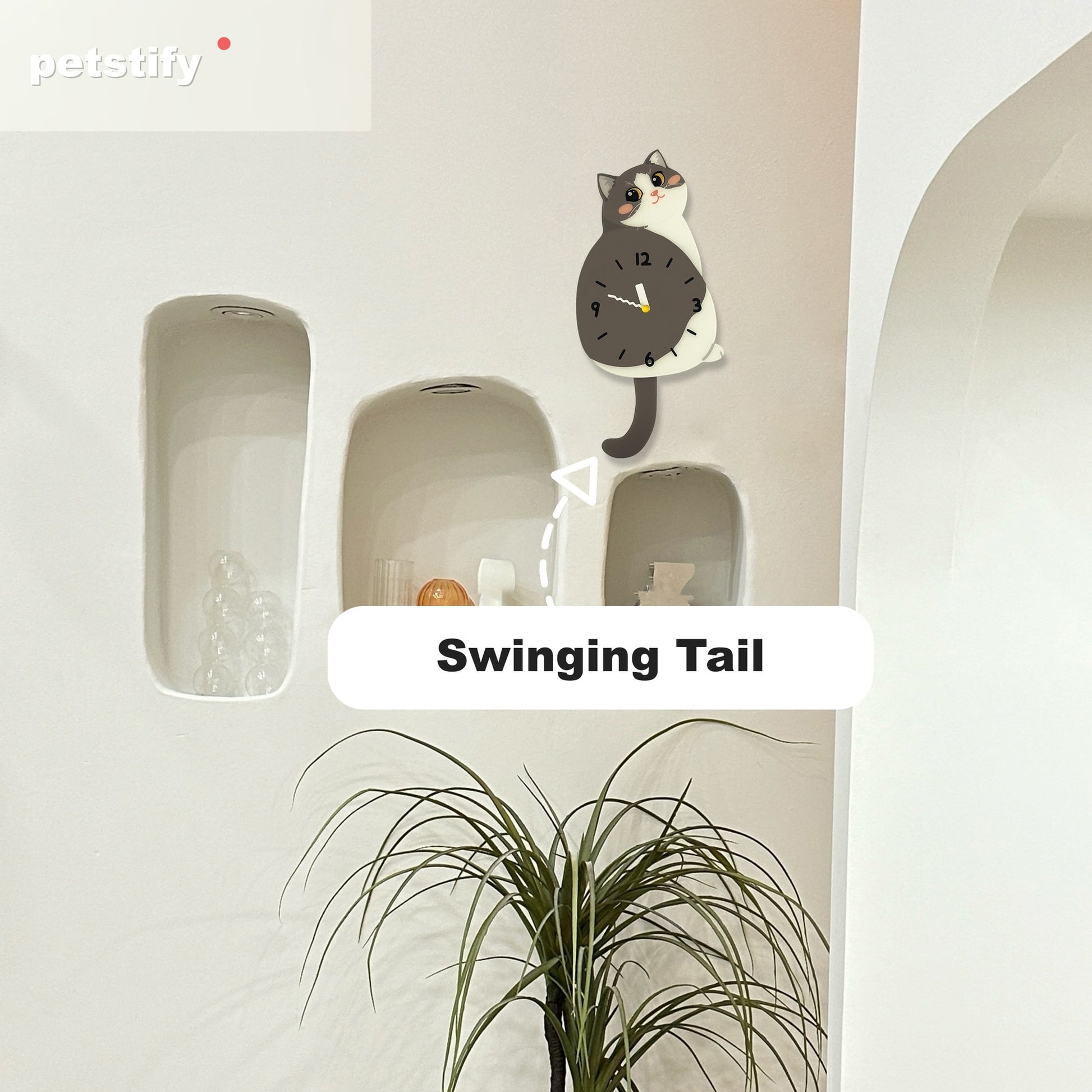 Petstify Blue and White Cat cat wall clock - styled on a home wall in a real room