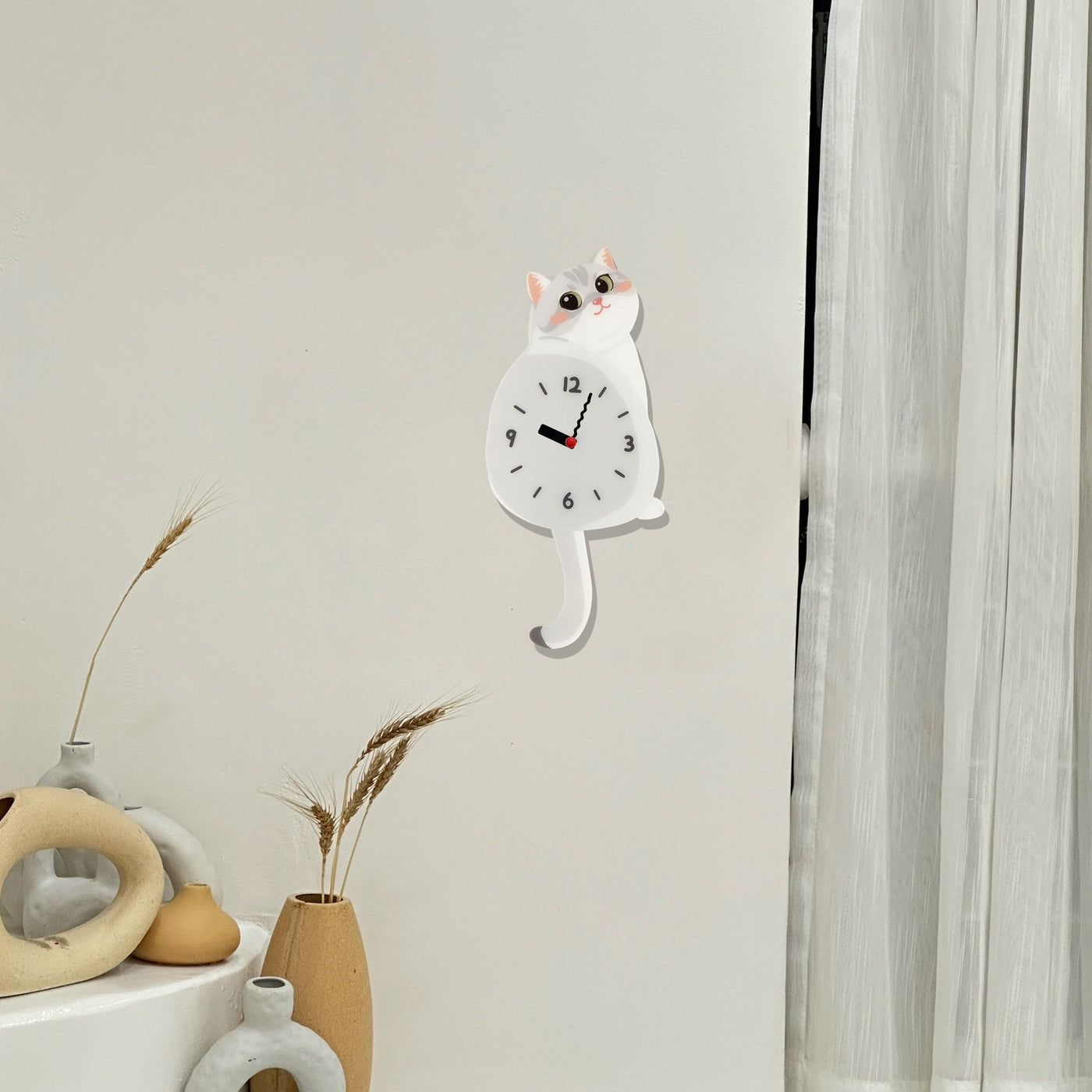 Silver Shaded Cat Swinging Tail Wall Clock styled as funny cat wall decor
