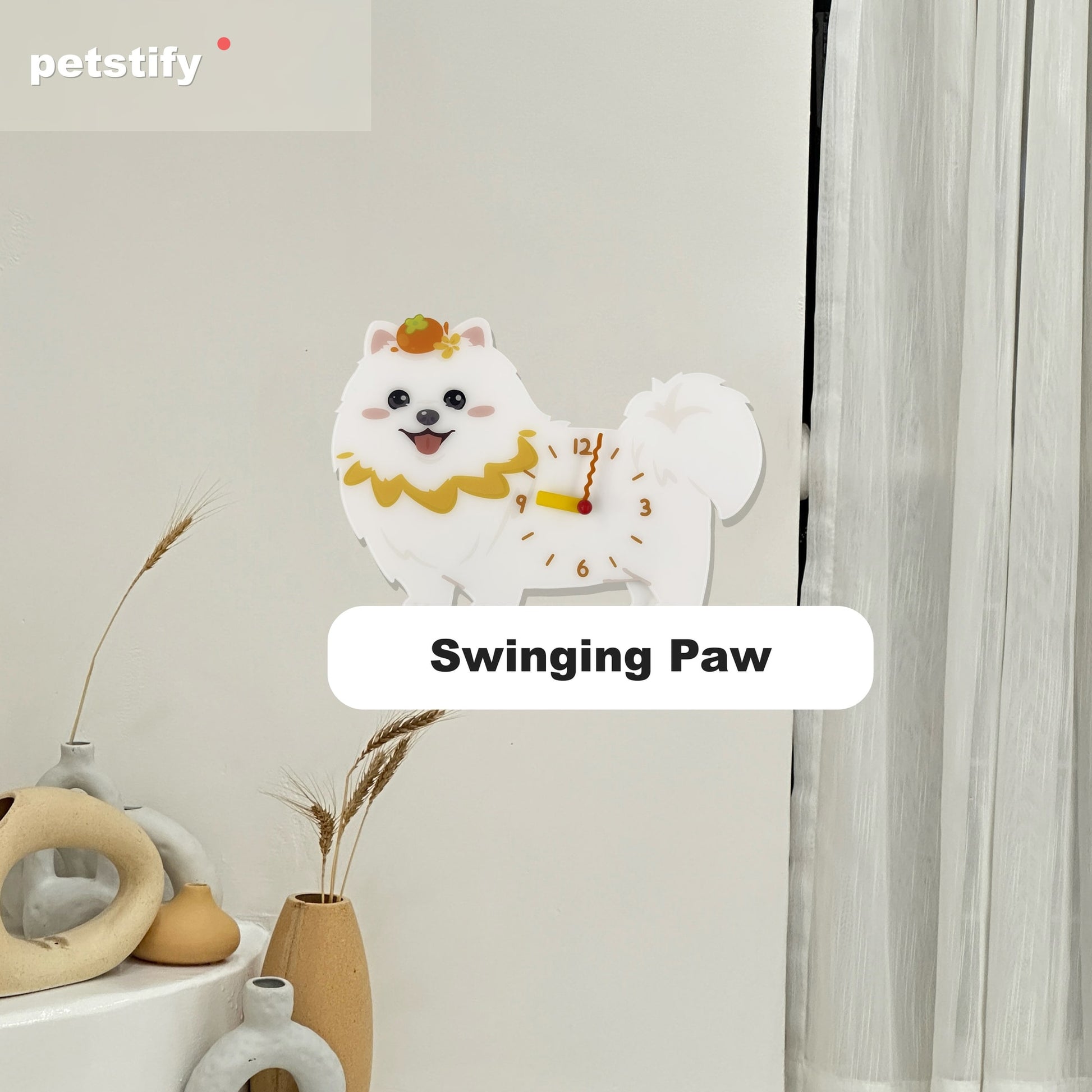Petstify Pomeranian dog wall clock - close-up of the swinging paw detail