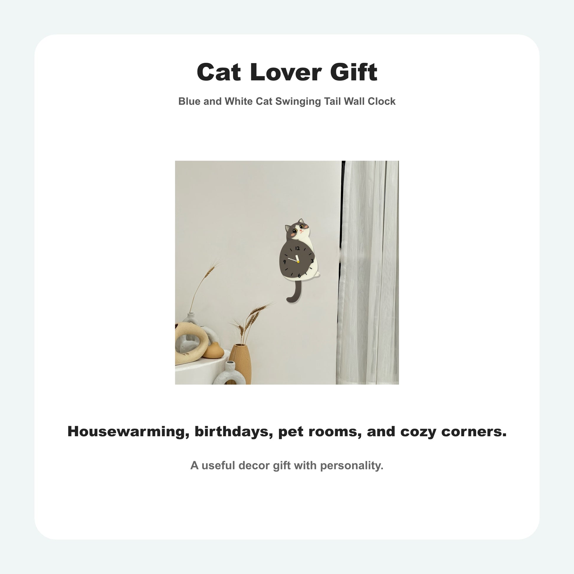 Blue and White Cat Petstify cat wall clock with playful swinging detail