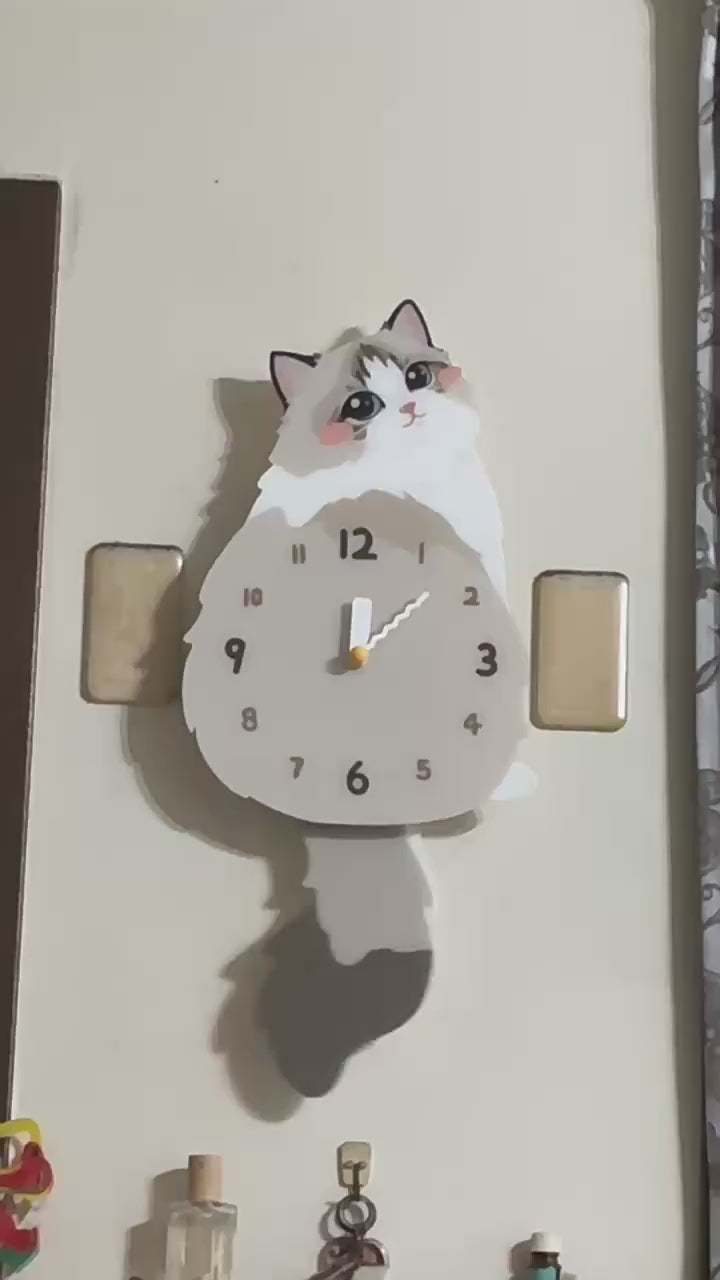 Seal Lynx Ragdoll wall clock original swinging tail demonstration