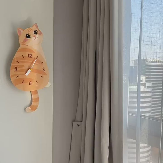 Orange Tabby Swinging Tail Wall Clock orange tabby swinging tail wall clock product video product media